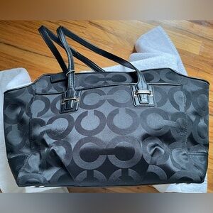 Coach Handbag in black.